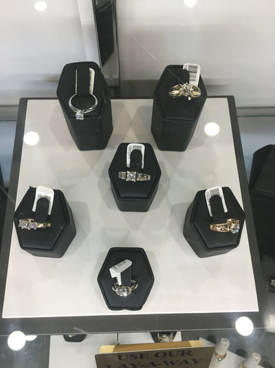 A beautiful selection of diamond rings at Presidential Pawn.